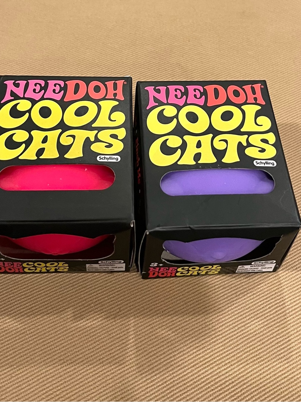 Two Needohs! Pink and Purple Cool Cat Needoh